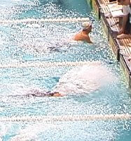 Ian Crocker, 17, of the Portland Porpoises, qualifies first in a new Olympic Trials record time of 52.82.