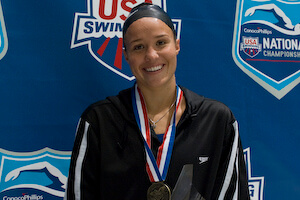 Haley McGregory on award stand after winning 100 Backstroke at 2007 US Nationals.