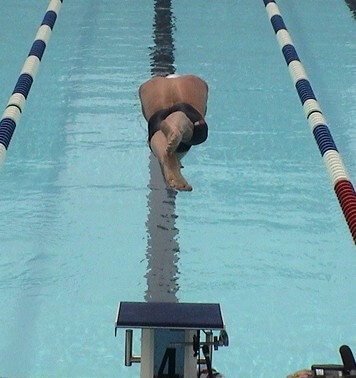 Brendon Hansen dives in for his breaststroke event