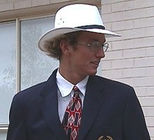 Aaron Peirsol looking sharp Before Opening Ceremonies. (Bet his hair still looks messed up under that hat)