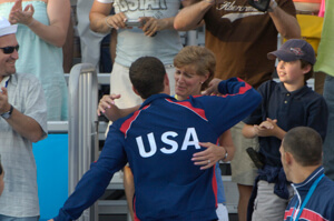 Brendan is congratulated by his mom after medals.