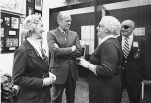 Former Fort Lauderdale Mayor Virginia Young, ISHOF Executive Director Buck Dawson with  Swimming-Coach Wife RoseMary, and President Ford discuss the President’s University of Michigan Swimming Instructor, Hall of Famer Matt Mann, during a 1977 visit to ISHOF.