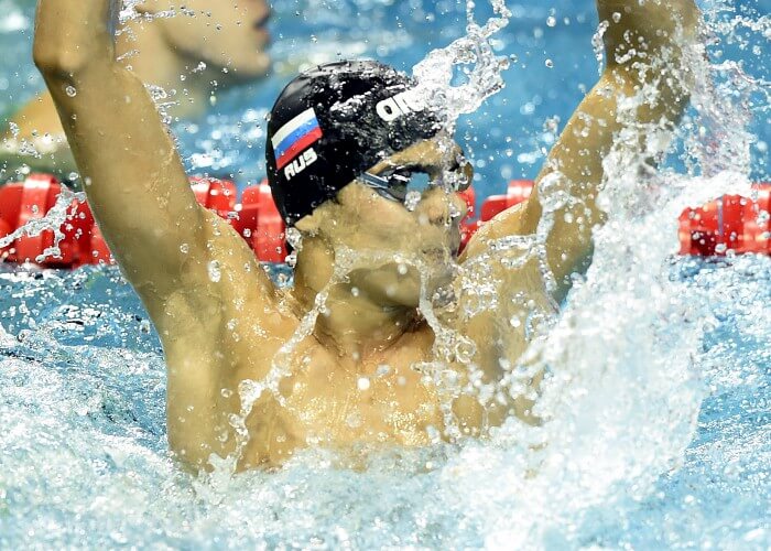 (140820) -- Nanjing, Aug 20,2014 (Xinhua) -- Evgeny Rylov of Russian Federation celebrates after the final of Men's 50m Backstroke of Nanjing 2014 Youth Olympic Games in Nanjing, capital of east China?s Jiangsu Province, on August 20, 2014. Evgeny Rylov won the gold. (Xinhua/Yue Yuewei) (lyq)
