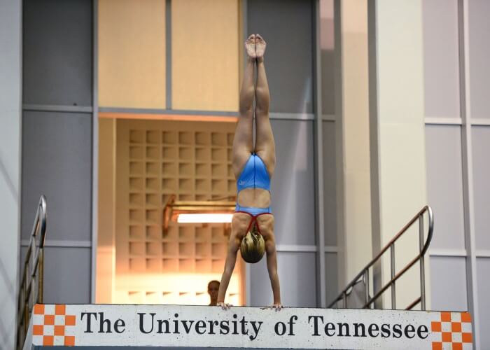 KNOXVILLE, TN - July 31, 2014: Lucy Roberts dives from the platforms during the 2014 USA Diving Age Group and Junior National Event at Allan Jones Aquatic Center in Knoxville, TN. Photo By Matthew S. DeMaria