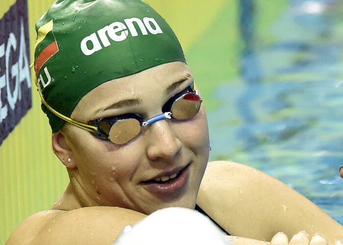 (140820) -- NANJING, Aug 20, 2014 (Xinhua) -- Ruta Meilutyte of Lithuania accepts congratulations after winning the Women's 100m Breaststroke match at Nanjing 2014 Youth Olympic Games in Nanjing, capital of east China's Jiangsu Province, on Aug. 20, 2014. Ruta Meilutyte of Lithuania won the gold medal.(Xinhua/Yue Yuewei)(hhx)