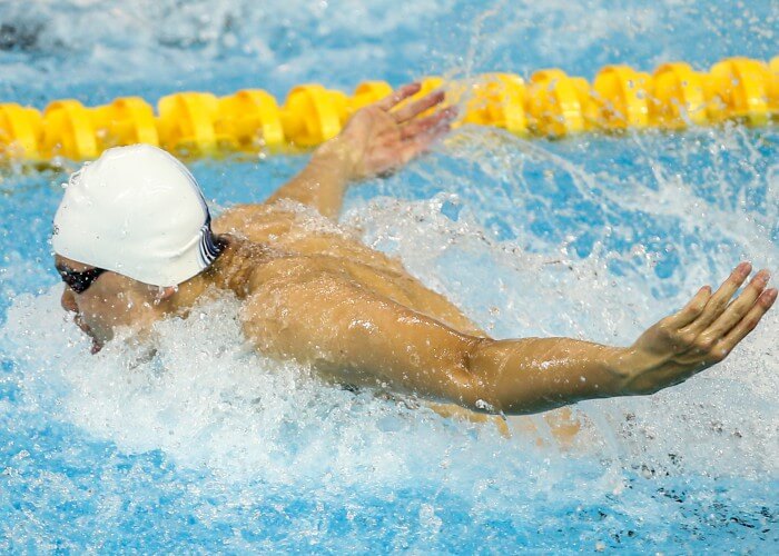 (140821) -- NANJING, Aug. 21, 2014 (Xinhua) -- Gold Medalist Yu Hexin of China competes during Men's 50m butterfly of swimming at the Nanjing 2014 Youth Olympic Games in Nanjing, east China's Jiangsu Province, Aug. 21, 2014. (Xinhua/Yang Lei)(zc)