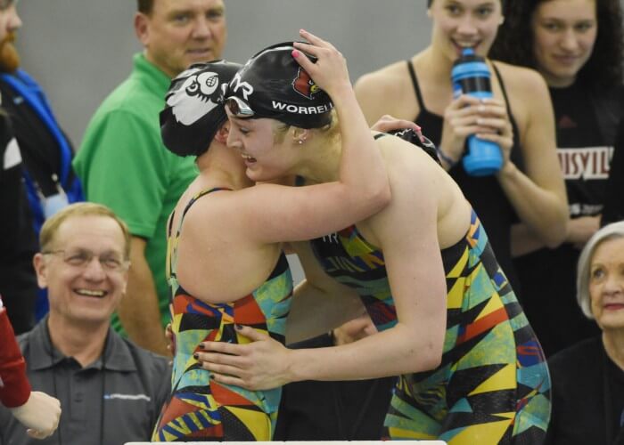 Mar 21, 2015; Greensboro, NC, USA; Kelsi Worrell hugs teammate Tanja Kylliainen after winning the 200 butterfly during NCAA Division I Swimming and Diving-Championships at Greensboro Aquatic Center. Mandatory Credit: Evan Pike-USA TODAY Sports