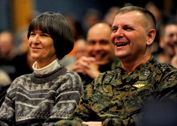 Vice Chairman of the Joint Chiefs of Staff U.S. Marine Gen. James E. Cartwright and his wife, Sandee, laugh during a USO performance at Eielson Air Force Base, Alaska, Nov. 10, 2008. Cartwright is on an eight-day, five-country visit to see troops. DoD photo by Air Force Master Sgt. Adam M. Stump. (Released)