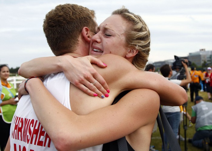 Jul 19, 2015; Toronto, Ontario, CAN; Nathan Schrimsher of the United States celebrates with Margaux Isaksen after placing third in the modern pentathlon during the 2015 Pan Am Games at Pan Am Aquatics UTS Centre and Field House. Mandatory Credit: Rob Schumacher-USA TODAY Sports