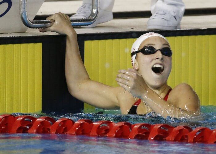Jul 17, 2015; Toronto, Ontario, CAN; Emily Overholt of Canada celebrates after winning the women's 400m freestyle final the 2015 Pan Am Games at Pan Am Aquatics UTS Centre and Field House. Mandatory Credit: Rob Schumacher-USA TODAY Sports