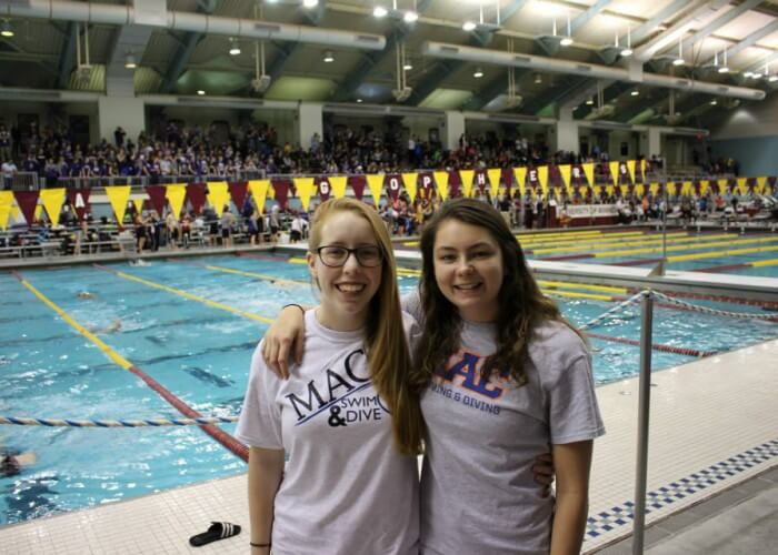 Molly Lloyd and teammate Anik Regan at the MIAC Swimming and Diving Championship Photo Courtesy: Alese Halvorson 
