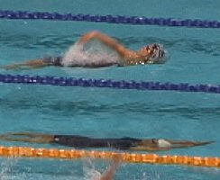 BJ Bedford a bit behind coming off the turn in the 100 Back final.