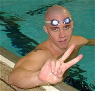 USC's Erik Vendt flashes the victory sign after winning the 500 free