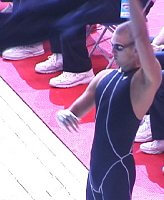 Anthony Ervin continues to stir up the crowd with a swing of his robe before the 100 Free Final.