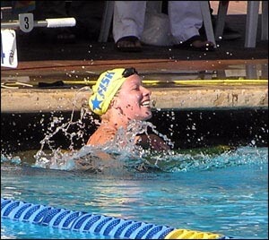 Kate Ziegler reacts to breaking Janet Evans' 1500 free world record.