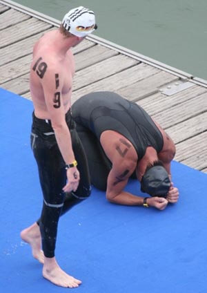 Ky Hurst (kneeling), Thomas Lurz (standing) at World Open Water Championships