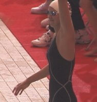 Rada Owen of Auburn waves just before finishing second in the 200 Free.