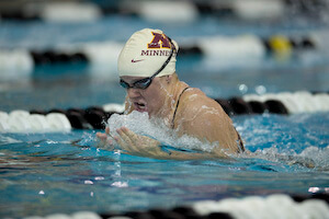 Jillian Tyler wins 200 breaststroke at Purdue Quad event.