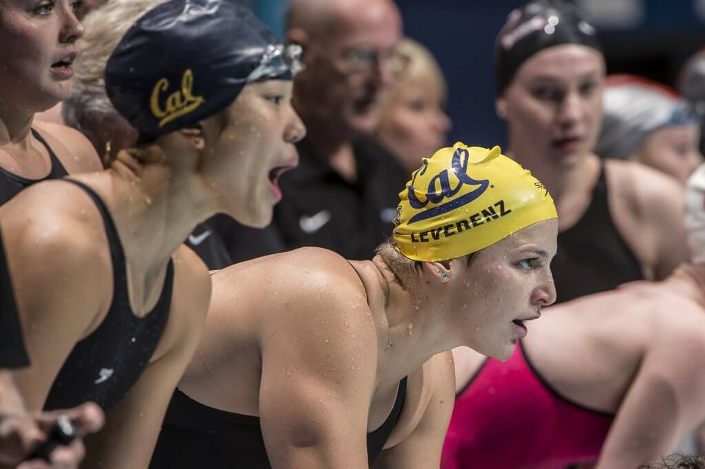 Caitlin Leverenz cheers her teammatesin the 400 medley relay. - mentor
