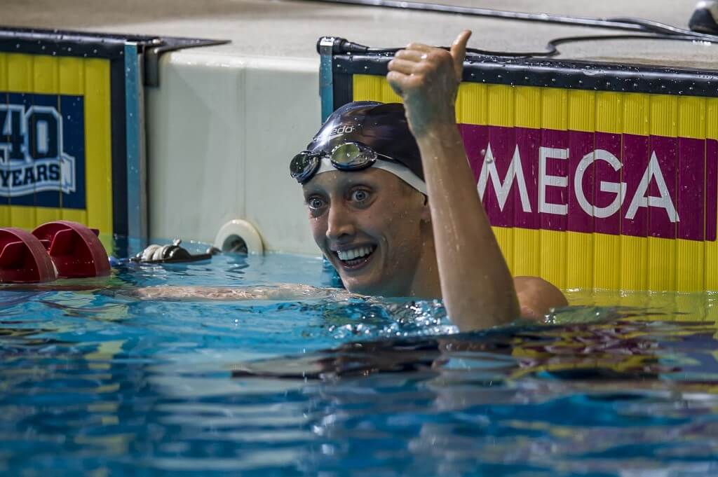 Breeja Larson wins the 100 breaststroke.