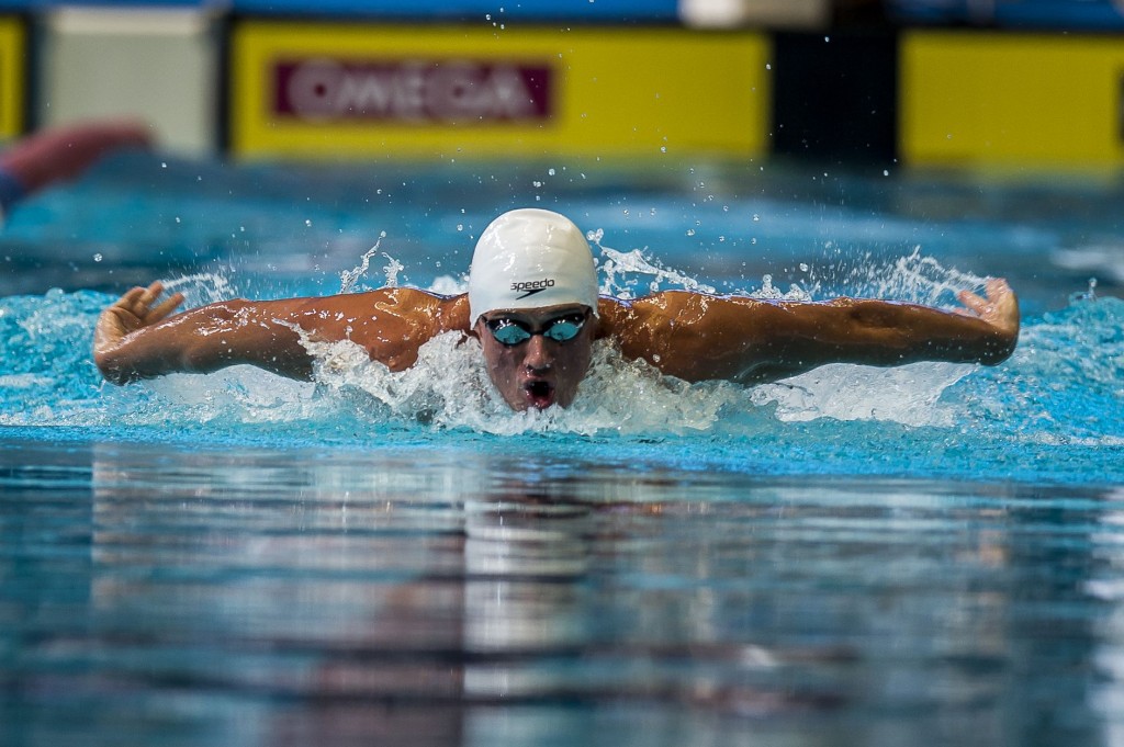Ryan Lochte places first in the prelims of the 100 butterfly.