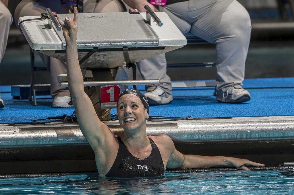 Laura Sogar wins the 200 breaststroke.