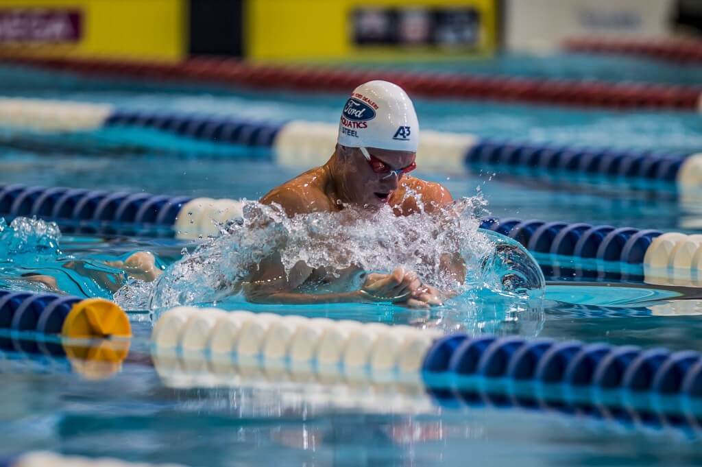 Kevin Steel sets a new US Open record as he wins the 50 breaststroke.