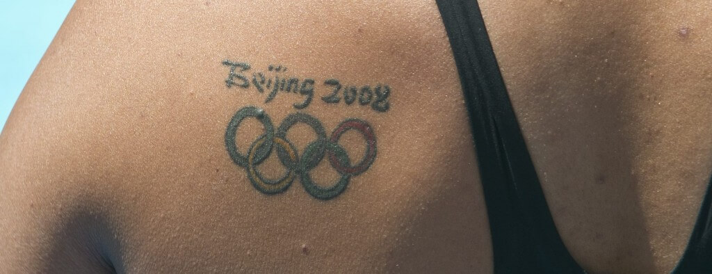 Calling All Swimmers With The Olympic Rings Tattoo
