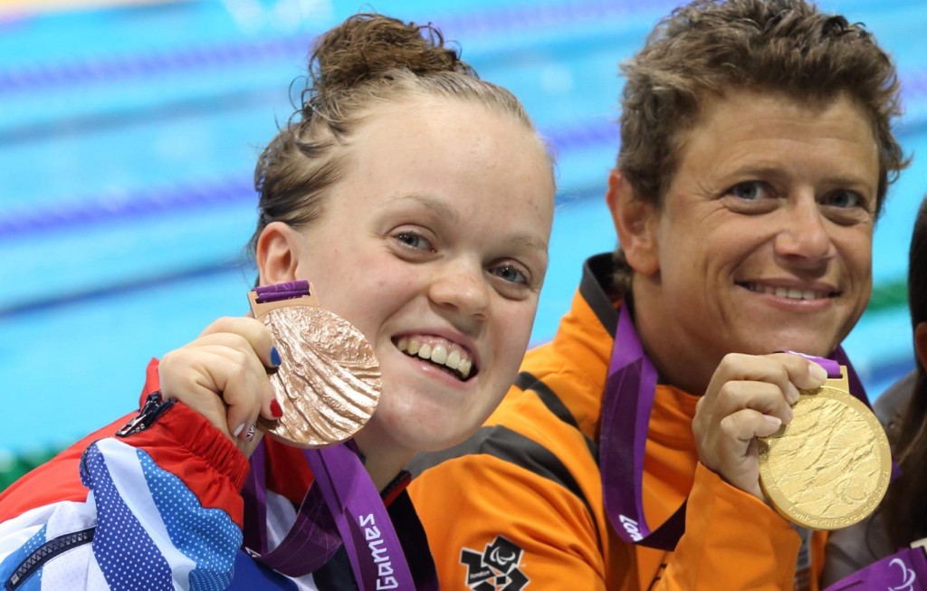 Sep 4, 2012; London, United Kingdom; Victory ceremony of the Women's 50m Freestyle S6 Mirjam de Koning-Peper (NED) with gold, Victoria Arlen (USA) with silver, Ellie Simmonds (GBR) with bronze during the London 2012 Paralympic Games at Aquatics Centre. Mandatory Credit: Paul Cunningham-US PRESSWIRE