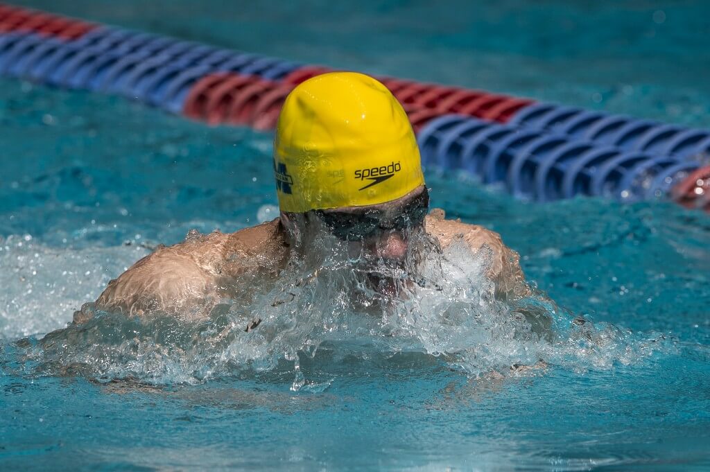 Richard Funk places third in the prelims of the 100 breaststroke.
