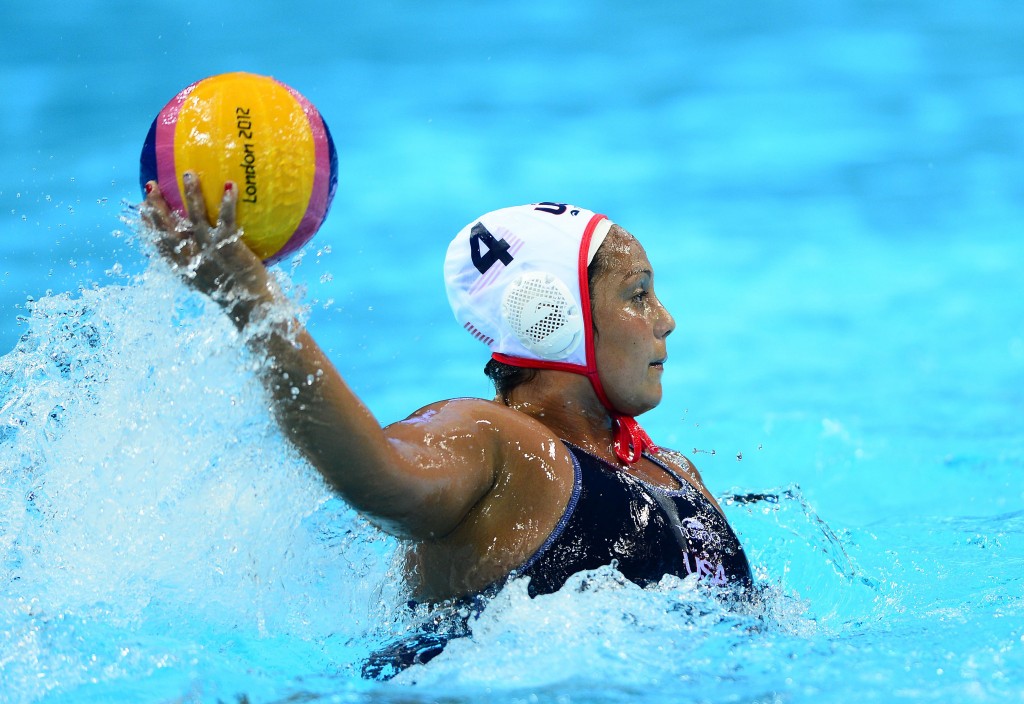 Aug 9, 2012; London, United Kingdom; USA player Brenda Villa (4) throws a pass in the third quarter against Spain in the women's gold medal match during the London 2012 Olympic Games at Water Polo Arena. Mandatory Credit: Andrew Weber-USA TODAY Sports