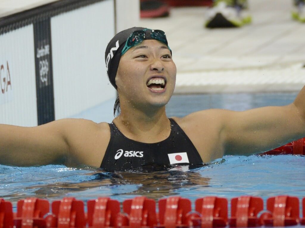 Jul 30, 2012; London, United Kingdom; Satomi Suzuki (JPN) reacts after finishing in third in the women's 100m breaststroke finals during the London 2012 Olympic Games at Aquatics Centre. Mandatory Credit: Richard Mackson-USA TODAY Sports