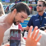 Michael Phelps signs autograph