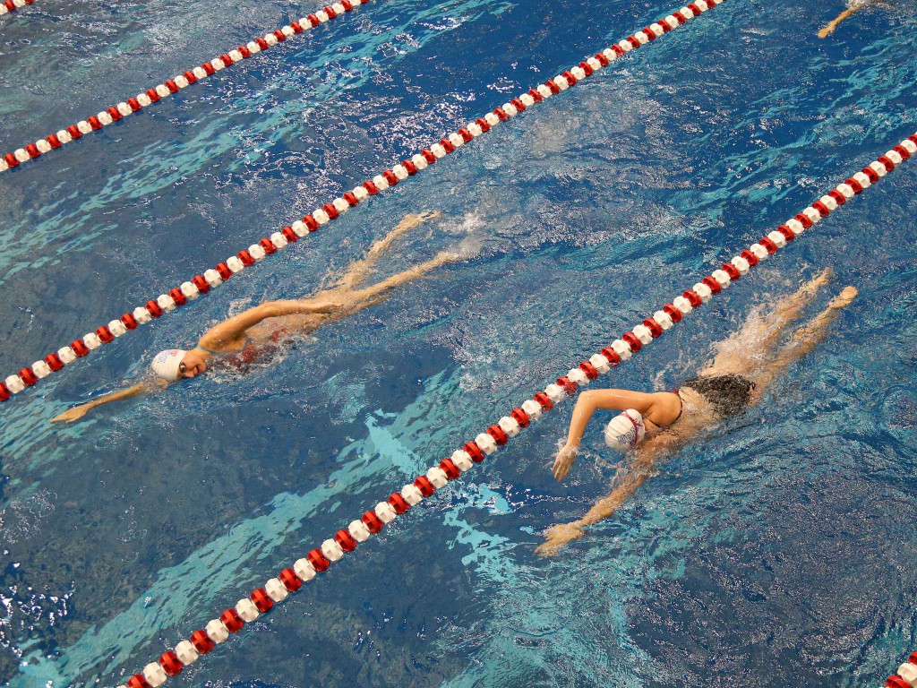 Jul 13, 2014; Athens, GA, USA; Swimmers warm up prior to the Sunday finals of the Bulldog Grand Slam at Gabrielsen Natatorium. Mandatory Credit: Kevin Liles-USA TODAY Sports