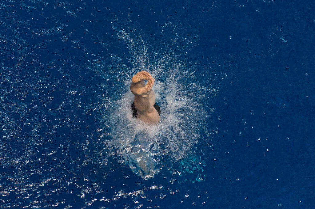zKNOXVILLE, TN - August 16, 2014: Aaron Fleshner during the 2014 USA Senior Diving National Event at Allan Jones Aquatic Center in Knoxville, TN. Photo By Matthew S. DeMaria
