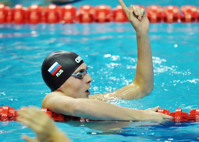 (140818) -- Nanjing, Aug 18,2014 (Xinhua) -- Gold medalist Anton Chupkov of Russian Federation celebrates after the final of Men's 100m Breaststroke of Nanjing 2014 Youth Olympic Games in Nanjing, capital of east China?s Jiangsu Province, on August 18, 2014. (Xinhua/Chen Yehua) (lyq)