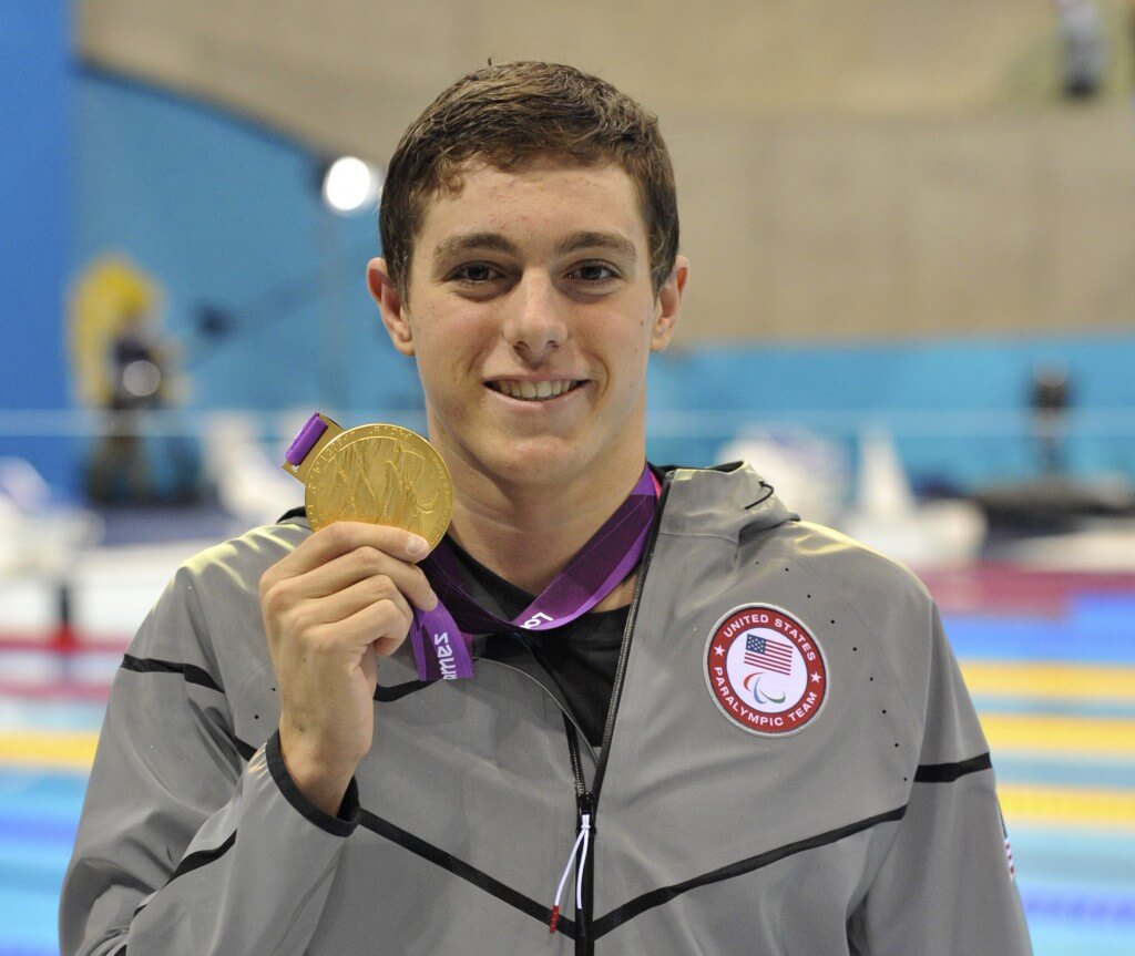 Sep 5, 2012; London, United Kingdom; Ian Jaryd Silverman (USA) shows off his gold medal from the men's 400m freestyle - S10 during the London 2012 Paralympic Games at Aquatics Centre. Mandatory Credit: Andrew Fielding-USA TODAY Sports