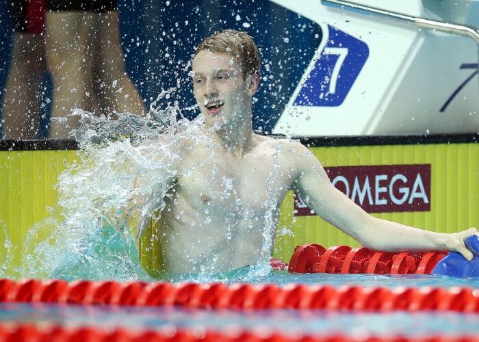 (140819) -- Nanjing,Aug 19,2014 (Xinhua) -- Luke Greenbank of Great Britain celebrates after Men's 4 x 100m Freestyle Relay final of swimming event of Nanjing 2014 Youth Olympic Games in Nanjing, capital of east China's Jiangsu Province, on Aug. 19, 2014. (Xinhua/Fei Maohua) (txt)