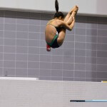 KNOXVILLE, TN - July 31, 2014: Madeline Wiese dives from the 1 meter springboard during the 2014 USA Diving Age Group and Junior National Event at Allan Jones Aquatic Center in Knoxville, TN. Photo By Matthew S. DeMaria