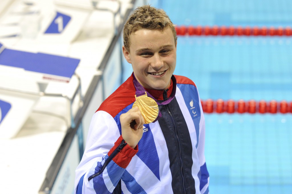 Sep 5, 2012; London, United Kingdom; Oliver Hynd (GBR) displays his gold medal after the medal ceremony for the men's 200m IM - SM8 during the London 2012 Paralympic Games at Aquatics Centre. Mandatory Credit: Andrew Fielding-USA TODAY Sports