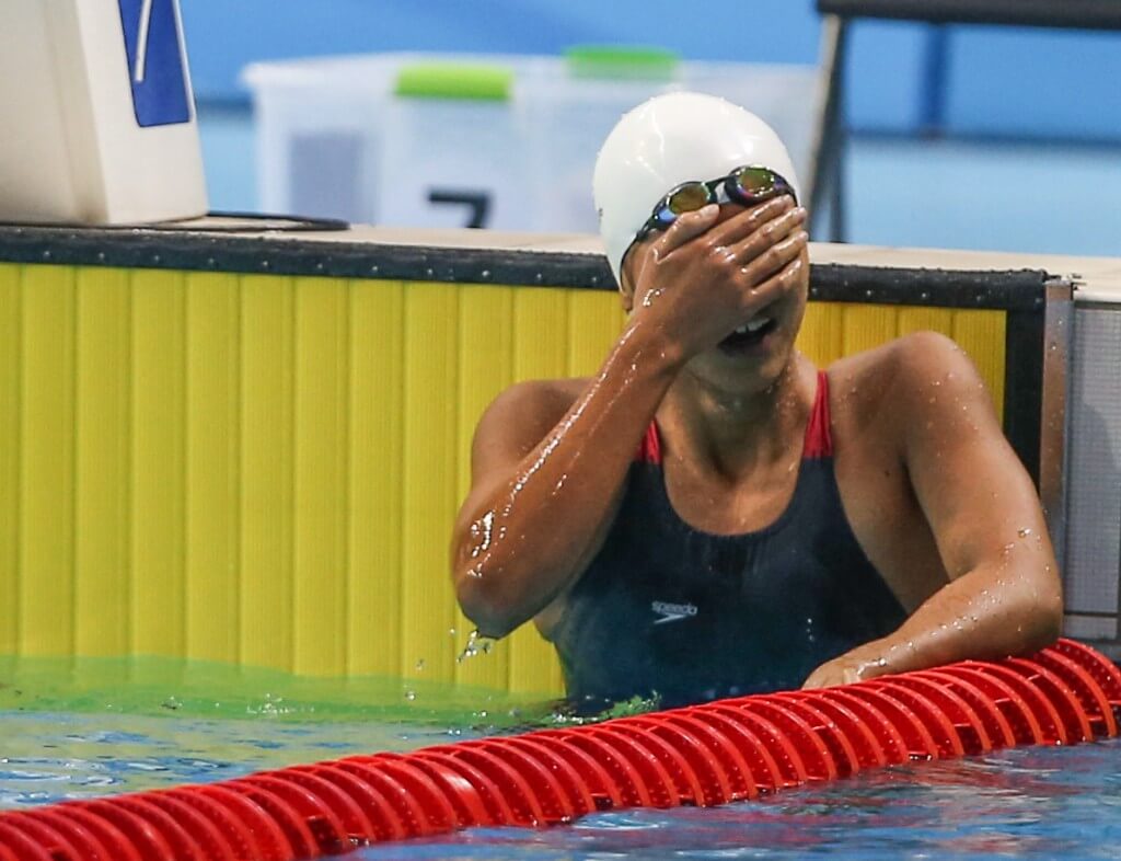 (140817) -- Nanjing,Aug 17,2014 (Xinhua) -- Gold medalist Vien Nguyen Thi Anh of Vietnam rests after the final of Women's 200m Individual Medley of Nanjing 2014 Youth Olympic Games in Nanjing, capital of east China?s Jiangsu Province, on Aug. 17, 2014. (Xinhua/Yang Lei) (txt)
