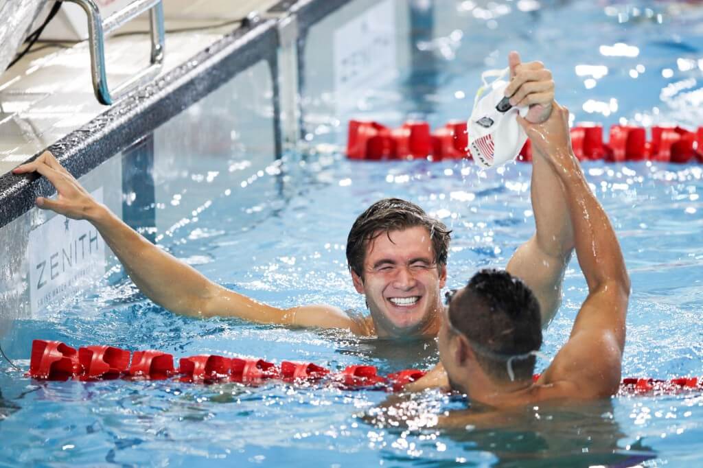 Swimming - Prudential Singapore Swim Stars 2014 - OCBC Aquatic Centre, Singapore Sports Hub, Singapore - 5/9/14 Men's 100m Freestyle - Nathan Adrian of USA (L) celebrates his win with Shinri Shioura of Japan Mandatory Credit: Action Images / Norman Ng Livepic EDITORIAL USE ONLY.