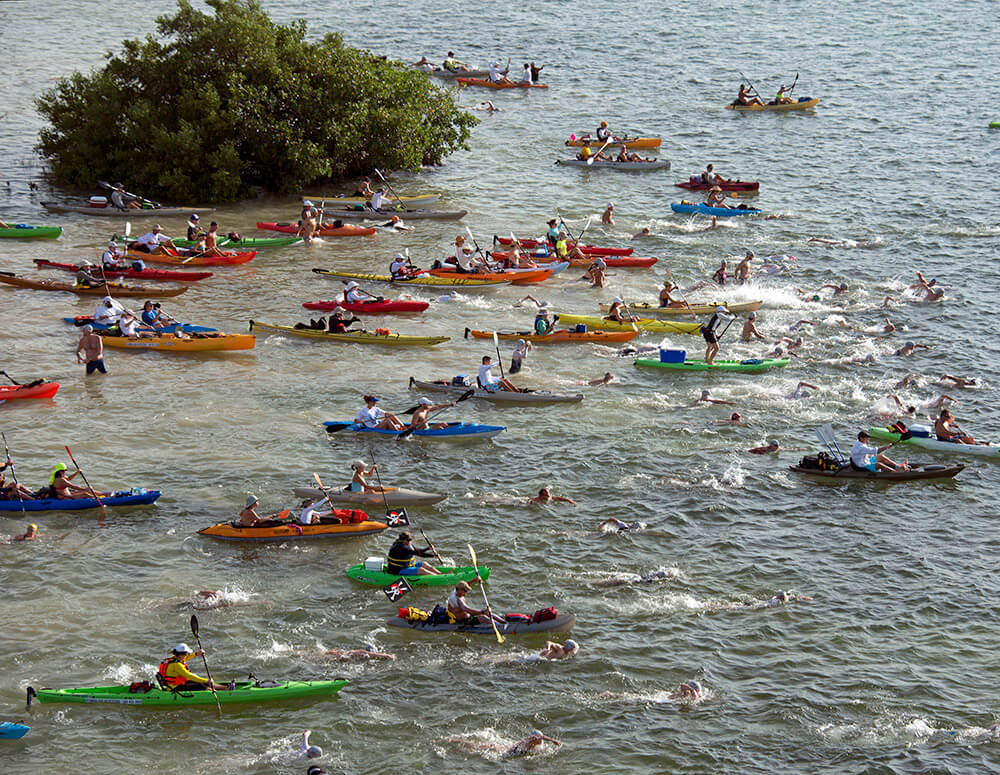 A portion of the field of 310 swimmers begin the Swim for Alligator Lighthouse Saturday, Sept. 20, 2014, in Islamorada, Fla. The eight-mile roundtrip open water swim, to-and-from Alligator Reef Lighthouse, serves as a fundraiser for local student college scholarships and to create awareness for the need to preserve six aging lighthouses off the Florida Keys island chain. FOR EDITORIAL USE ONLY (Andy Newman/Florida Keys News Bureau/HO)