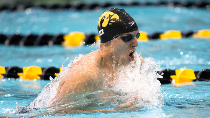 Iowa's Roman Trussov swims the breast stroke leg of the 200 yard medley relay during their meet against Michigan and Nebraska Saturday, Oct. 4, 2014 at the Campus Wellness and Recreation Center in Iowa City. (Brian Ray/hawkeyesports.com)