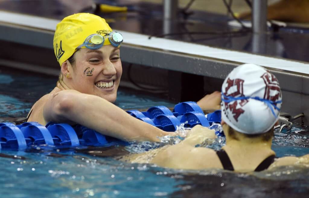 Mar 21, 2015; Greensboro, NC, USA; Missy Franklin and Beryl Gastaldello congratulate each other after swimming in 400m freestyle relay during NCAA Division I Swimming and Diving-Championships at Greensboro Aquatic Center. Mandatory Credit: Evan Pike-USA TODAY Sports
