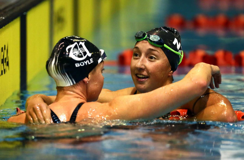 Emma Robinson is embraced by Lauren Boyle after both swimmers qualified for the World Champs in the 800m free during the New Zealand Open Swimming Championships, Westwave Aquatic Centre, Henderson, Auckland, Thursday 16 April 2015. Photo: Simon Watts/www.bwmedia.co.nz