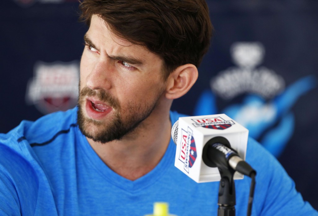 Apr 15, 2015; Mesa, AZ, USA; 18-time Olympic gold medalist Michael Phelps holds a press conference at the Arena Pro Swim Series at Skyline Aquatic Center in Mesa, AZ. Phelps, 29, returns from a six-month suspension by USA Swimming after his arrest Sept. 30 when he was accused of driving under the influence. Phelps pleaded guilty to that charge in December was sentenced to 18 months supervised probation in lieu of one year in prison. The probation includes random drug and alcohol testing. Phelps also completed a 45-day treatment program in Arizona. Mandatory Credit: Rob Schumacher/Arizona Republic via USA TODAY Sports
