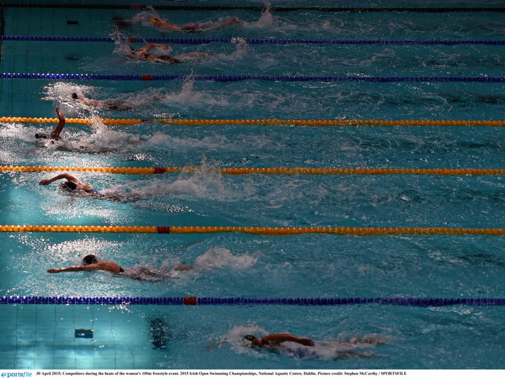 30 April 2015; Competitors during the heats of the women's 100m freestyle event. 2015 Irish Open Swimming Championships, National Aquatic Centre, Dublin. Picture credit: Stephen McCarthy / SPORTSFILE