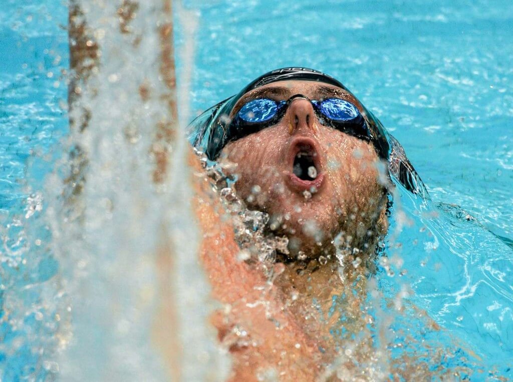 1 May 2015; Michael Taylor, NCSA, on his way to winning the men's 100m backstroke event during the 2015 Irish Open Swimming Championships at the National Aquatic Centre, Abbotstown, Dublin. Picture credit: Paul Mohan / SPORTSFILE