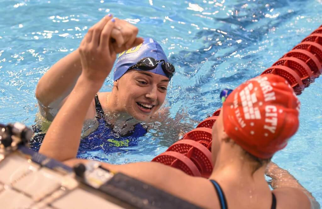 2 May 2015; Shauna O'Brien, UCD, left, is congratulated by Bethany Carson, Lisburn, after winning her semi-final of the women's 100m butterfly event during the 2015 Irish Open Swimming Championships at the National Aquatic Centre, Abbotstown, Dublin. Picture credit: Stephen McCarthy / SPORTSFILE